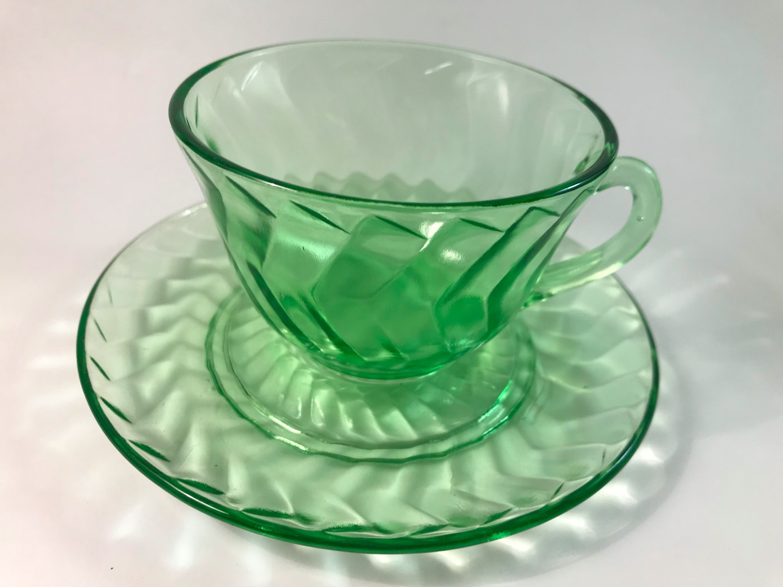 5 green vaseline glass teacups with saucers and one extra saucer VINTAGE