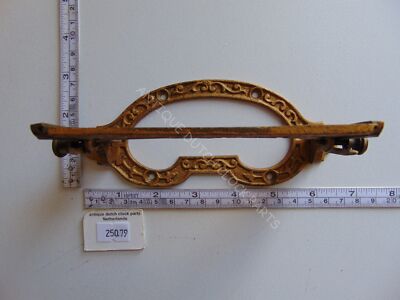 ANTIQUE BRASS CLOCK SEAT FOR A GERMAN REGULATOR CLOCK WITH DP CLOCKWORK