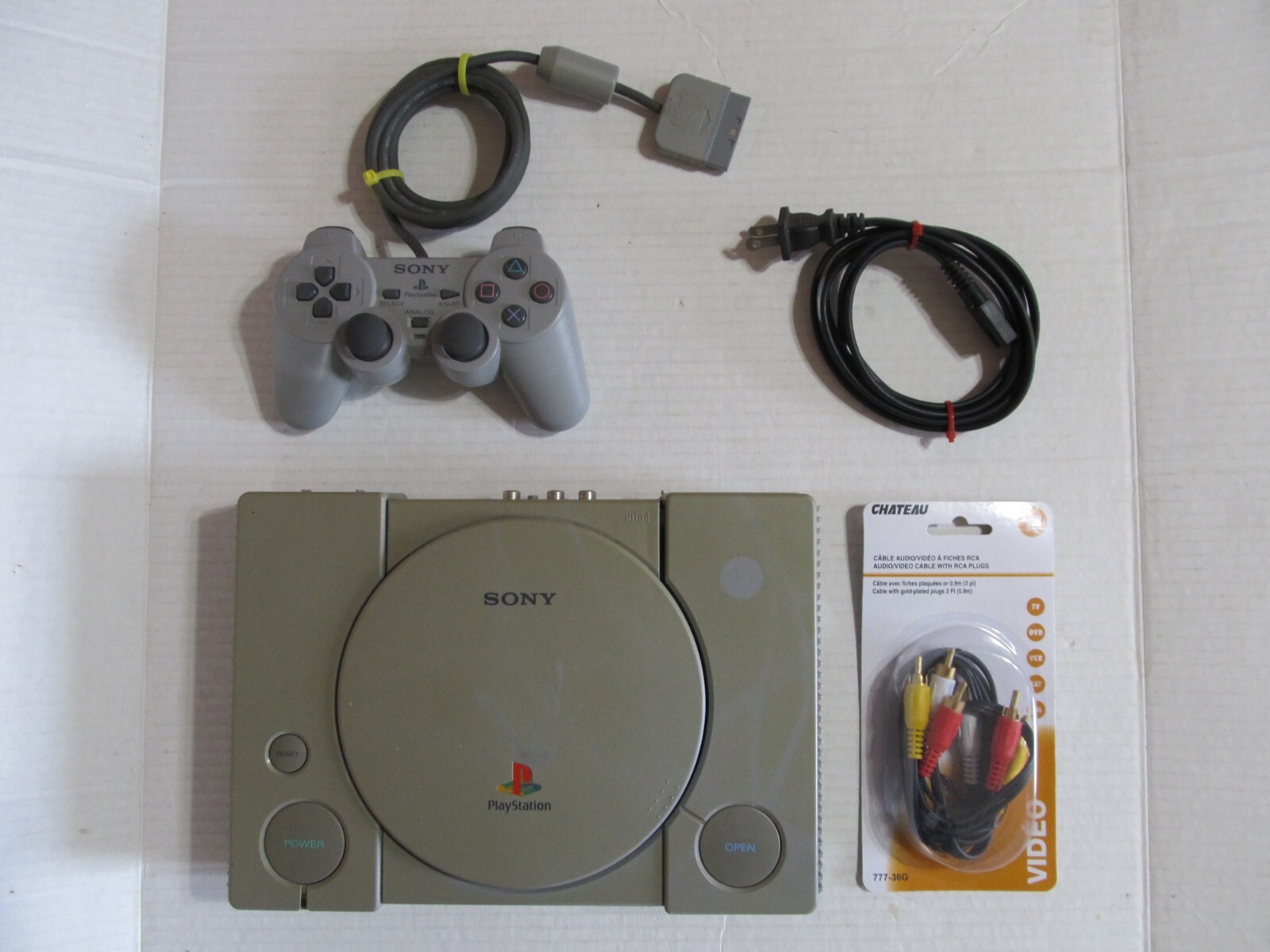 SONY PLAYSTATION 1 CONSOLE, MODEL SCPH-1001 WITH RCA OUTPUT SONY PLAYSTATION 1 CONSOLE, MODEL SCPH-1001 WITH RCA OUTPUT