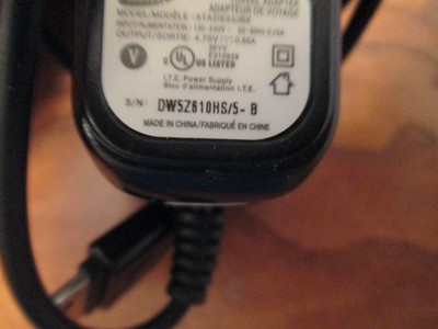TRAVEL ADAPTER INPUT 100-240V/50-60Hz/0.15A OUTPUT 4.75V/0.55A