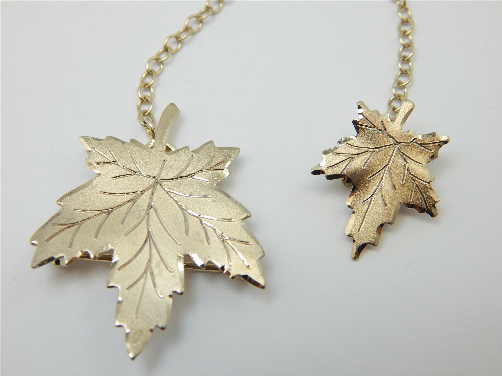 GOLD OVER STERLING DOUBLE DIAMOND CUT MAPLE LEAF PINS BROOCH