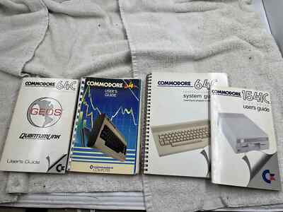 Commodore C64 Manuals Lot (4 manuals / books) (System, Users Guide, QuantumLink)