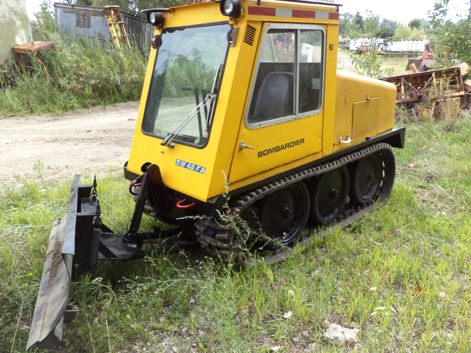 Bombardier SW48 snowcat,ATV, new tracked machine, two plows,sidewalk clean,CAT,