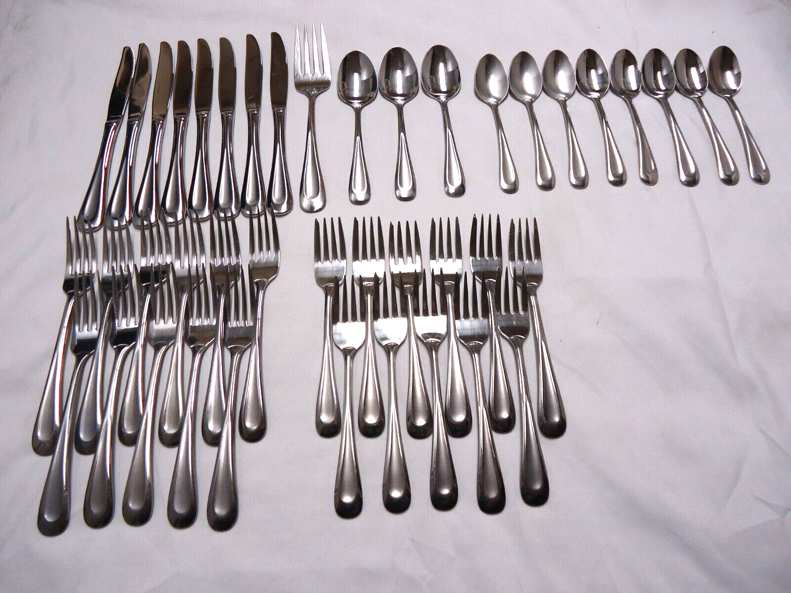 ONEIDA SAND DUNE STAINLESS FLATWARE 42-pcs.