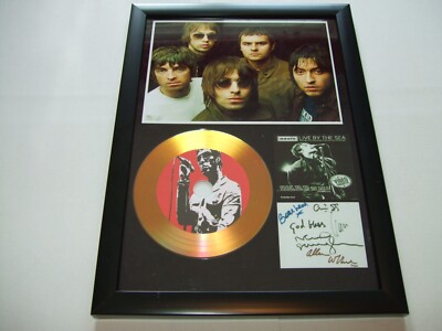OASIS  LIMITED EDITION SIGNED   AUTOGRAPH 8 FRAMED A4
