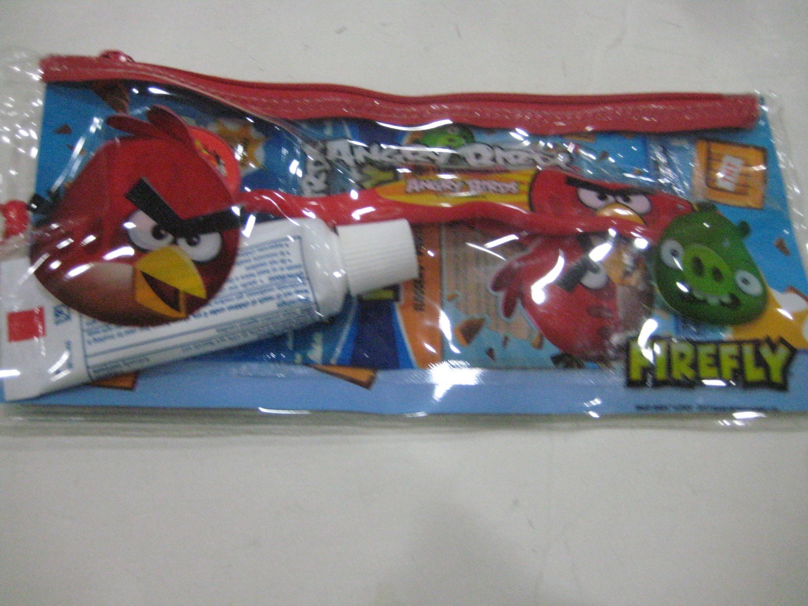 ANGRY BIRDS FIREFLY DENTAL TRAVEL KIT 4 PC (Red Brush)