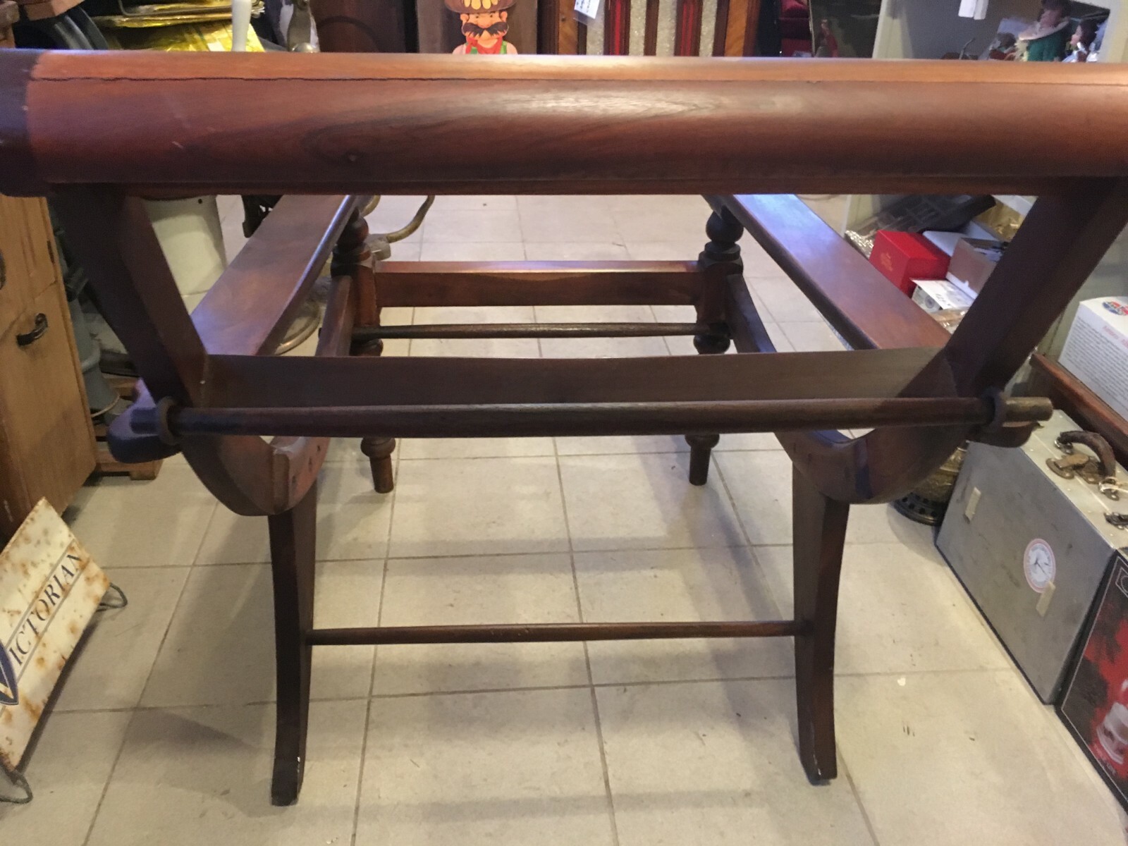 LARGE ANTIQUE PLANTATION CHAIR WITH FOLD OUT ARMS AND ROLLED FABRIC HOLDERS