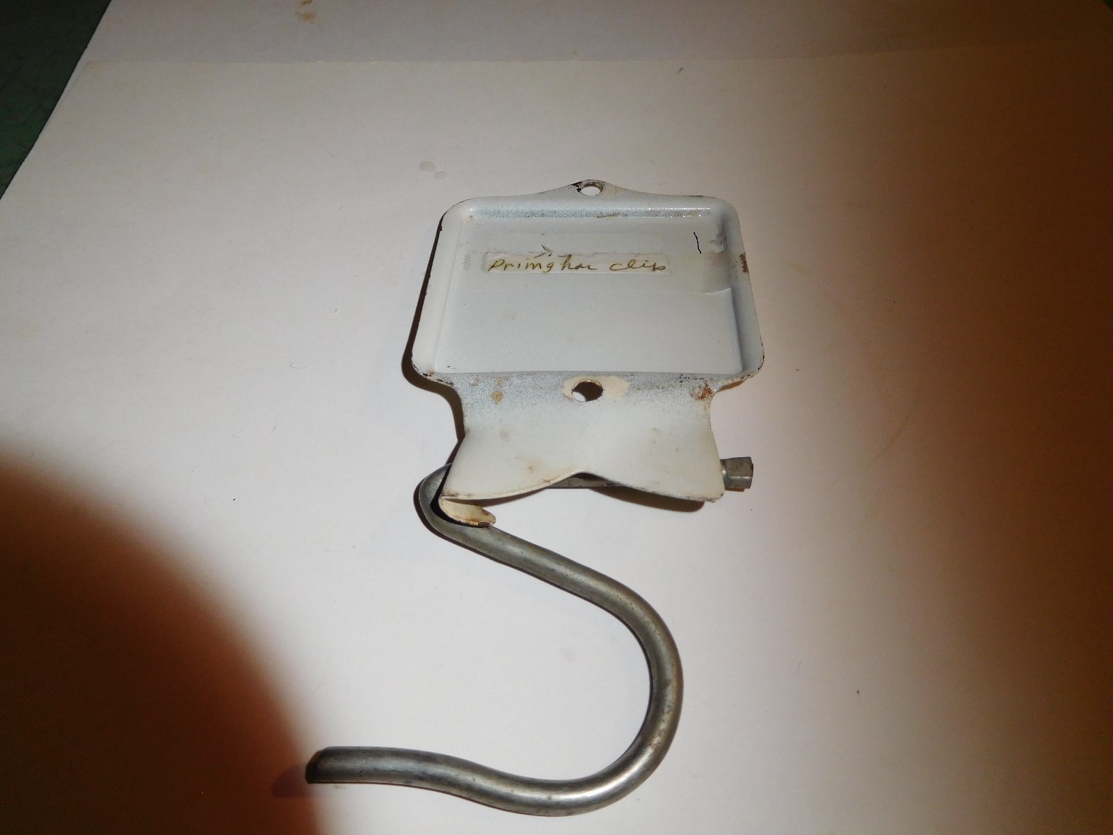 PRIMGHAR, IOWA--BERGINS GORCERY-DRY GOODS-METAL BROOM HOLDER ADV-FOLDS UP