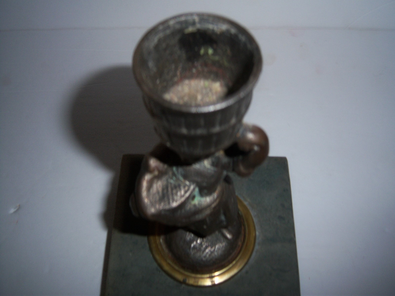 ..ANTIQUE CAST IRON WOMAN CANDLE HOLD ON MARBLE