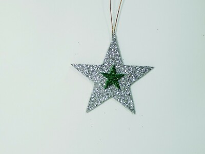 Adornos Navideños. Purpurina Plateada Estrella 5 puntas.