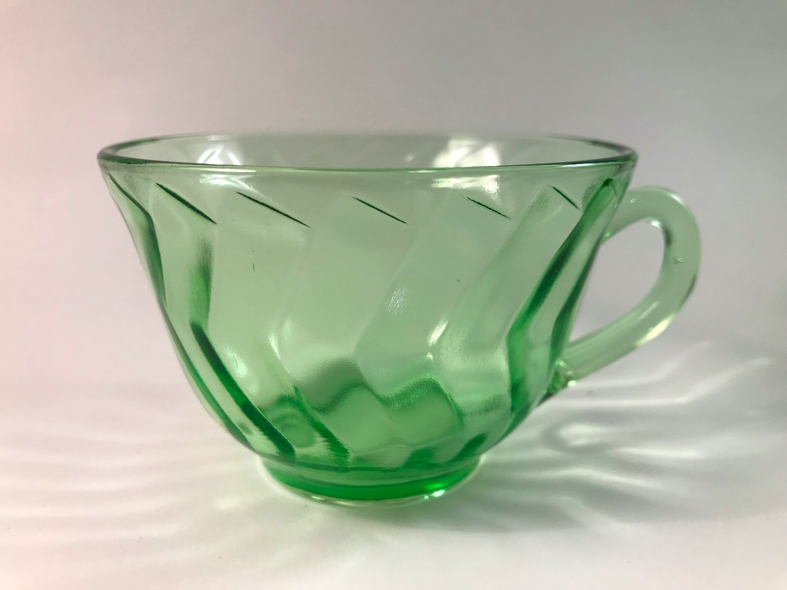 5 green vaseline glass teacups with saucers and one extra saucer VINTAGE