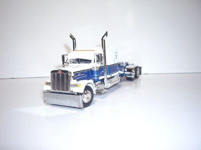 DCP FIRST GEAR 1/64 BLUE AND WHITE PETERBILT 379 WITH 63'' SLEEPER