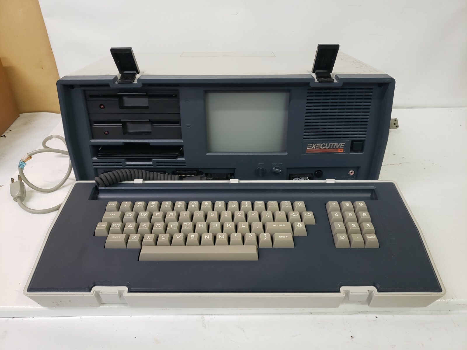 Used OSBORNE EXECUTIVE 0 VINTAGE COMPUTER, OCC 2. Powers on and
