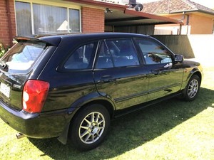Мазда 323 2003