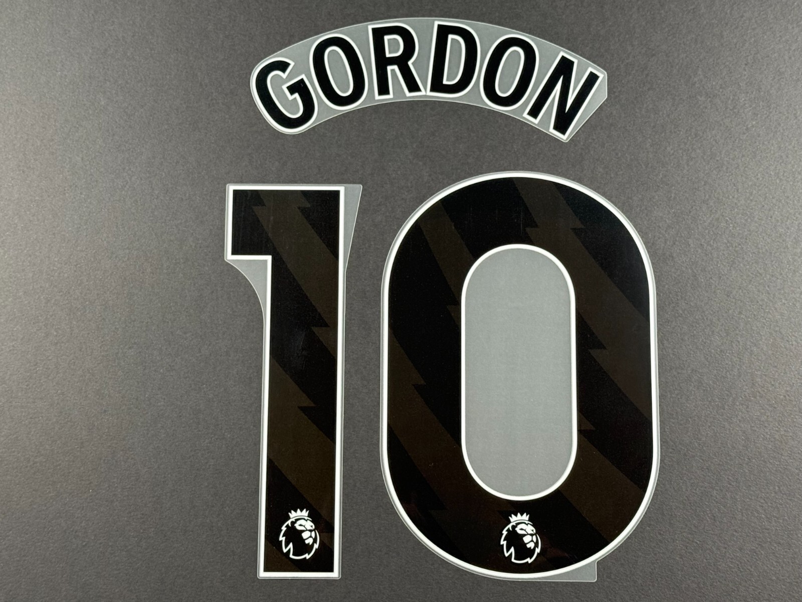 NEWCASTLE 2024 2025 GORDON 10 OFFICIAL AVERY DENNISON BLACK PLAYER