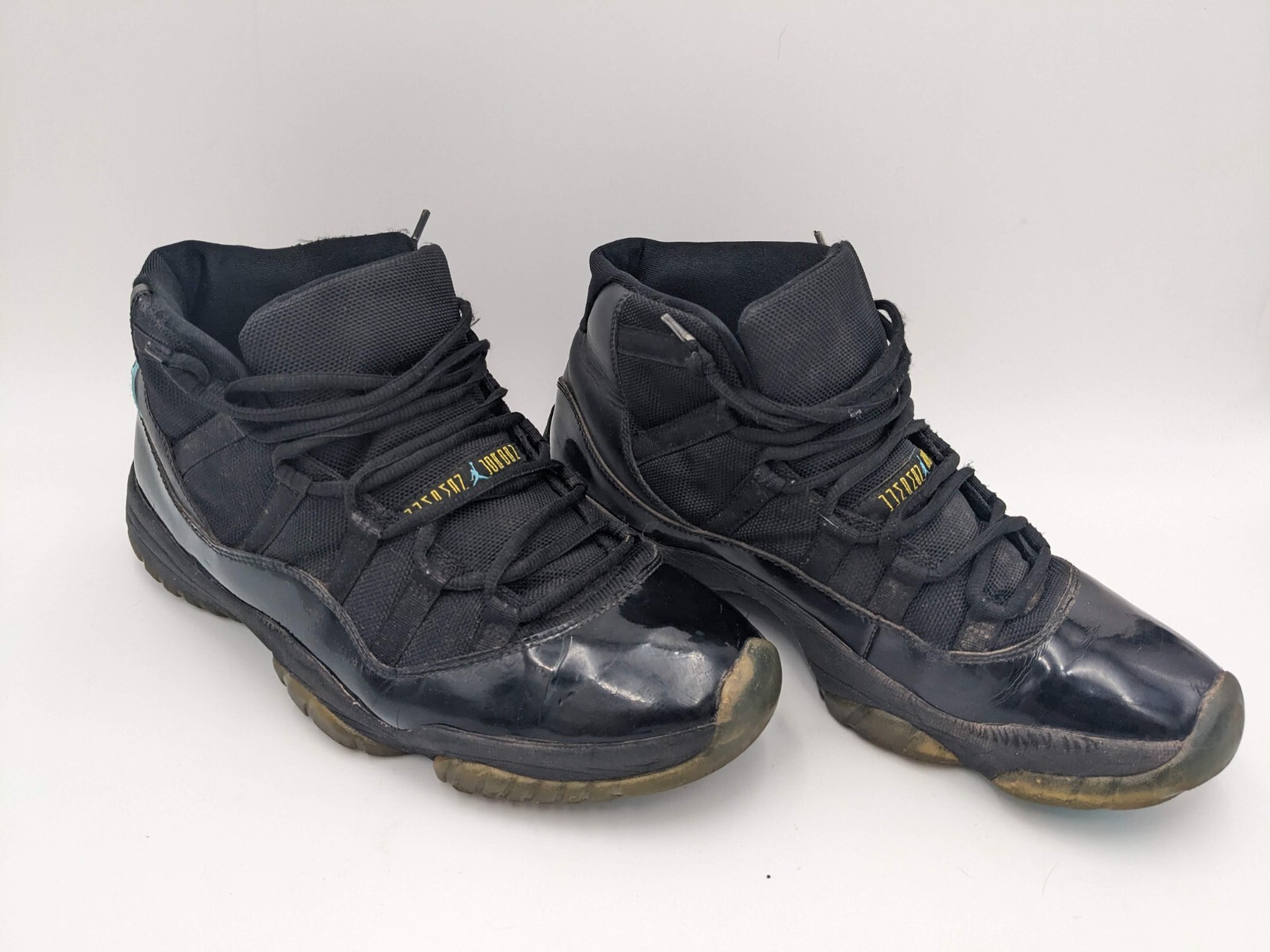 black and yellow jordans 11