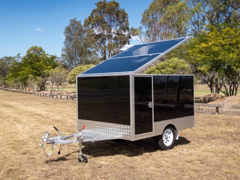 Black enclosed luggage trailer with open roof