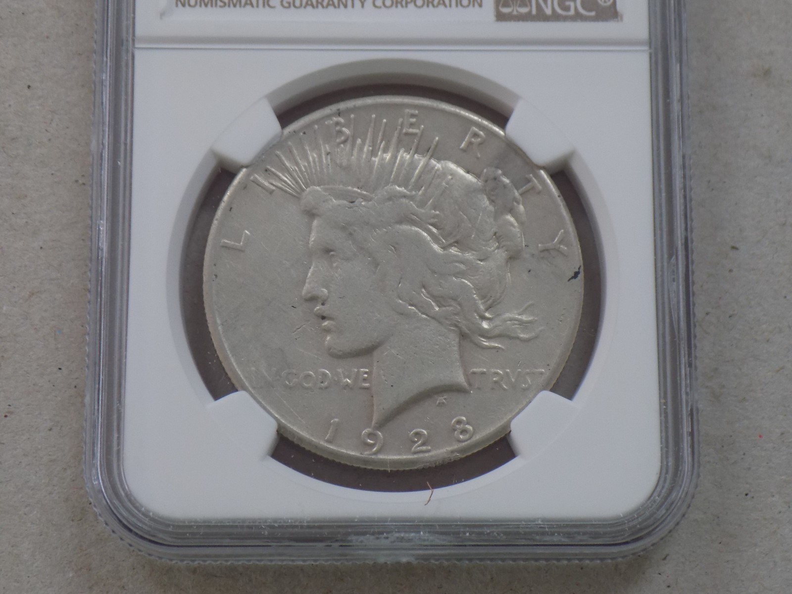 1928 $1 PEACE DOLLAR NGC VF DETAILS