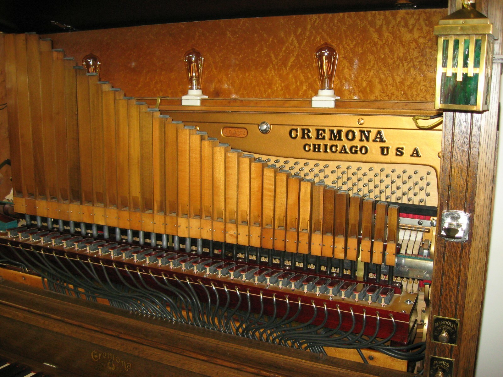 Prairie Style Craftsman nickelodeon coin op player piano with organ pipes