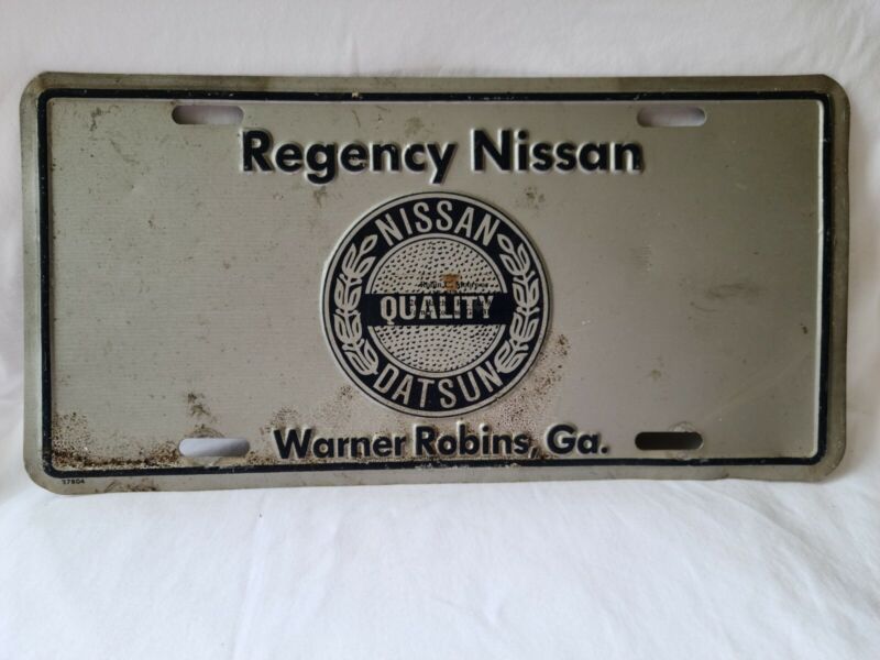 Vintage Regency Nissan Datsun Warner Robins Georgia Booster License Plate