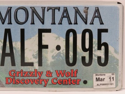 Montana License Plate ALF-095 Grizzly & Wolf Discovery Center Specialty Plate