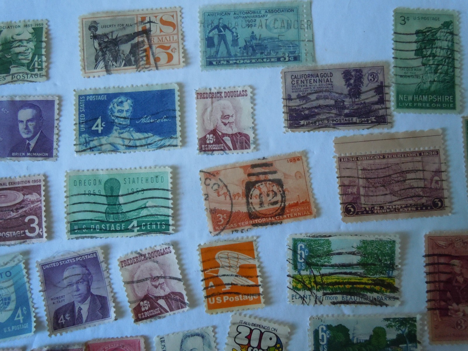 Assorted US  stamps 70 used ephemera paper collectibles lots stamp lots