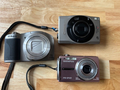lot of 3 Digital cameras Nikon Canon Olympus