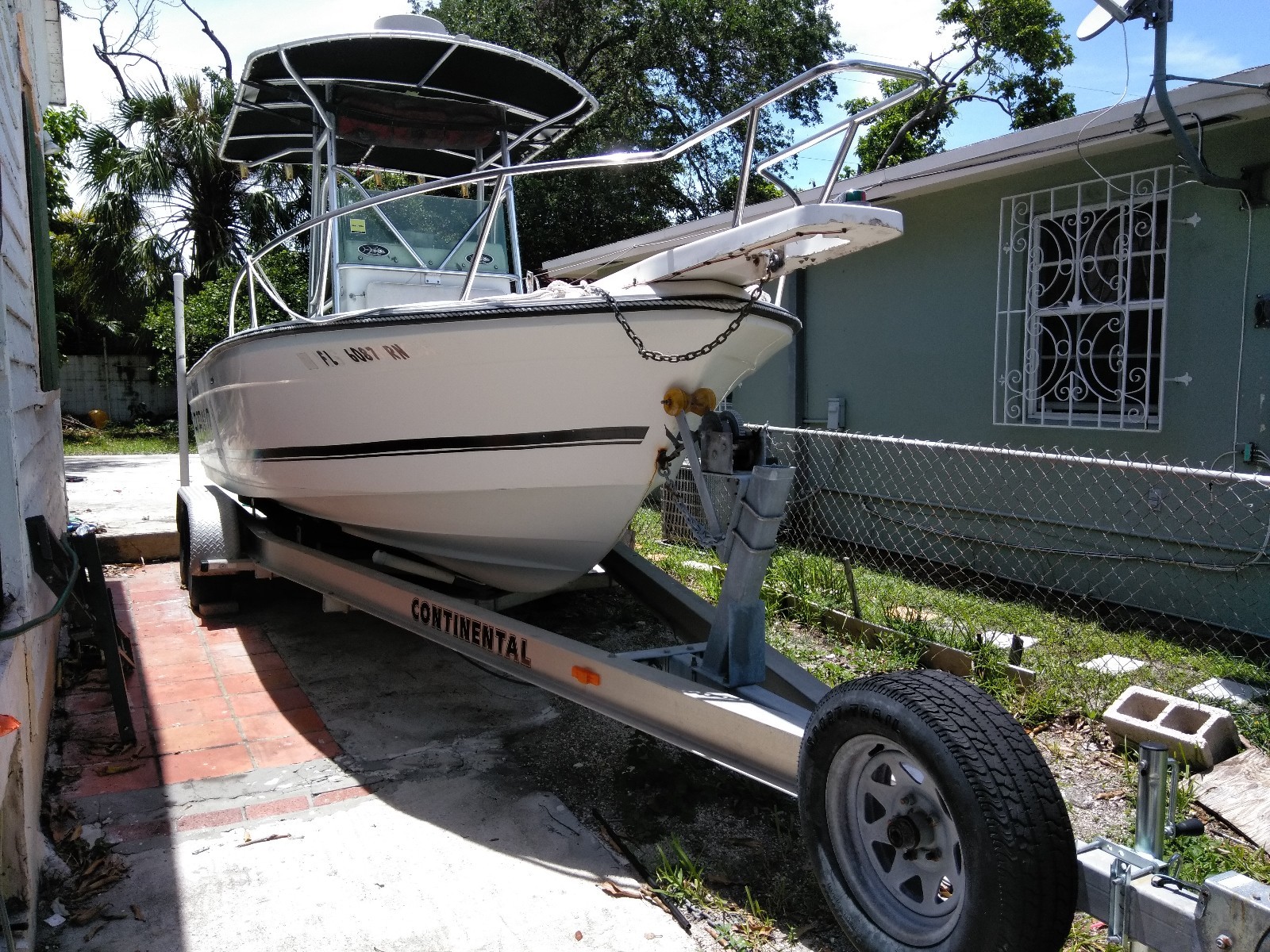 1995 Robalo 21 center console with double Axel continental trailer included,