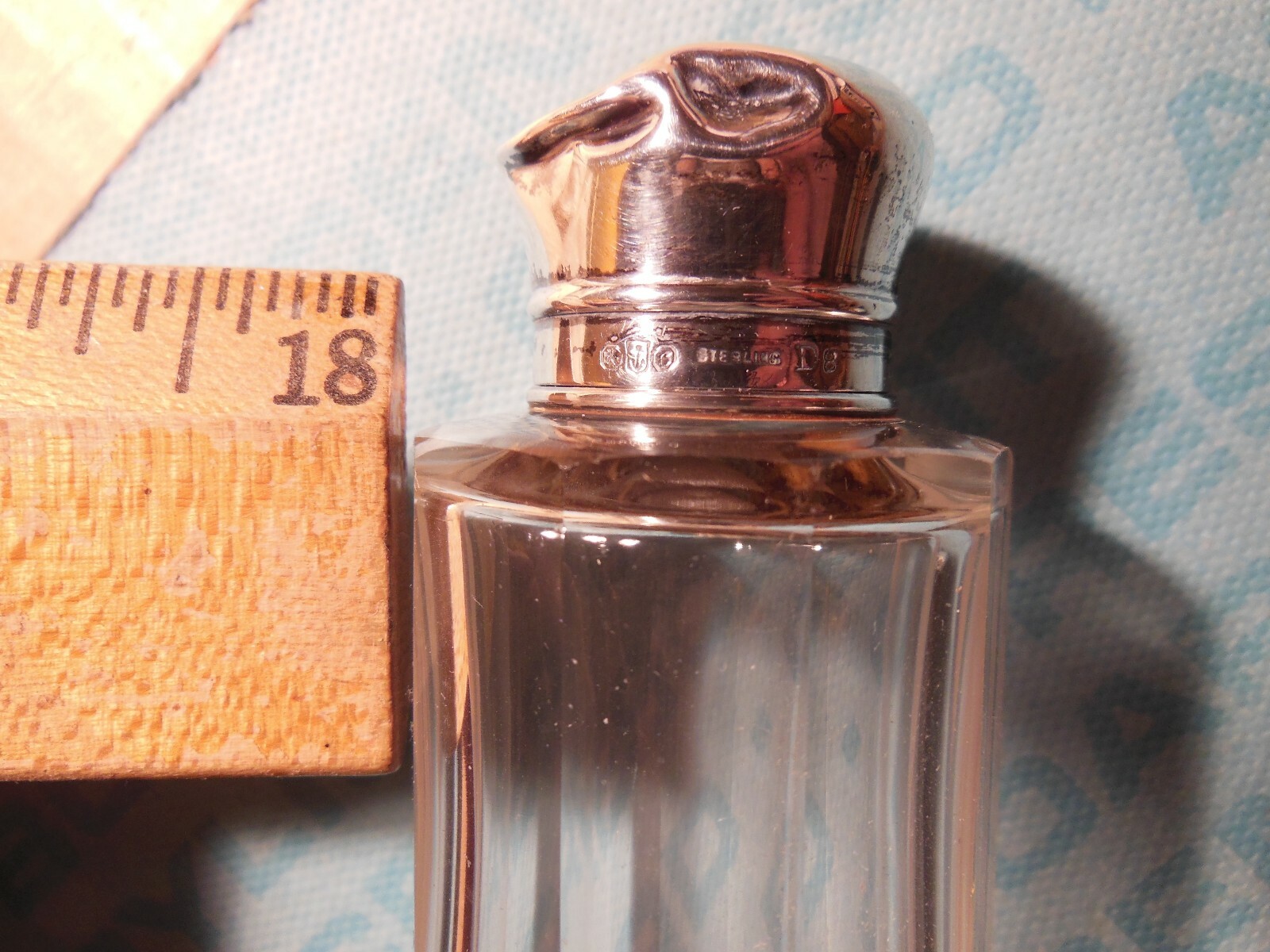Two sterling silver & cut glass cologne bottles, English hallmarks