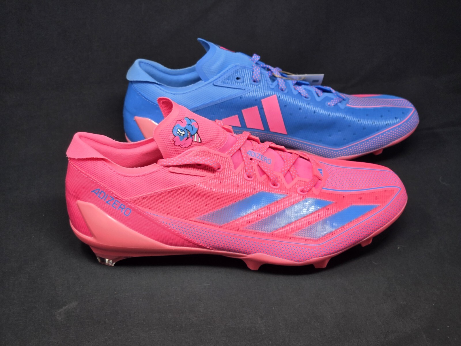 blue and pink adidas cleats