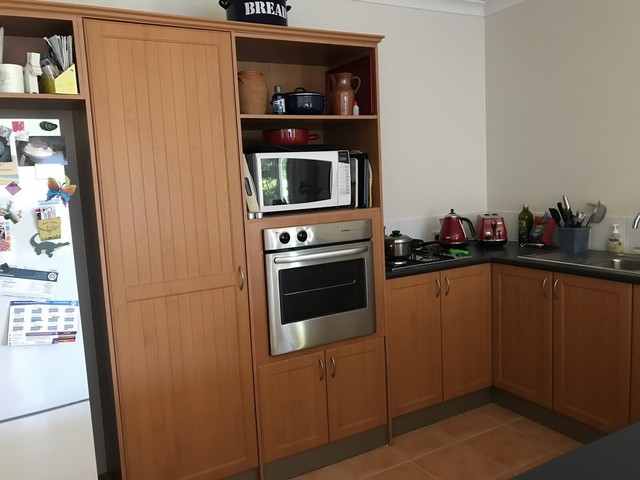 Second hand kitchen - wood look finish, cabinets, drawers ...