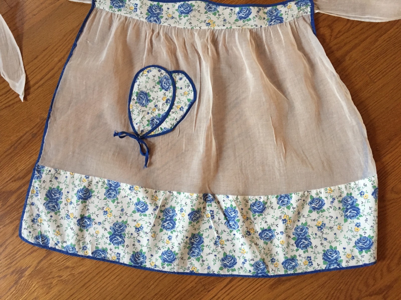 Vintage sheer hostess farmhouse half apron 1950's blue floral pocket detail