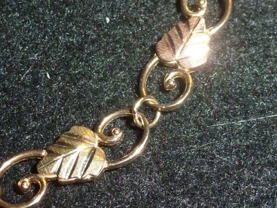 10K SOLID YELLOW & ROSE GOLD SCROLL-WORK VINE BRACELET - 7 5/8