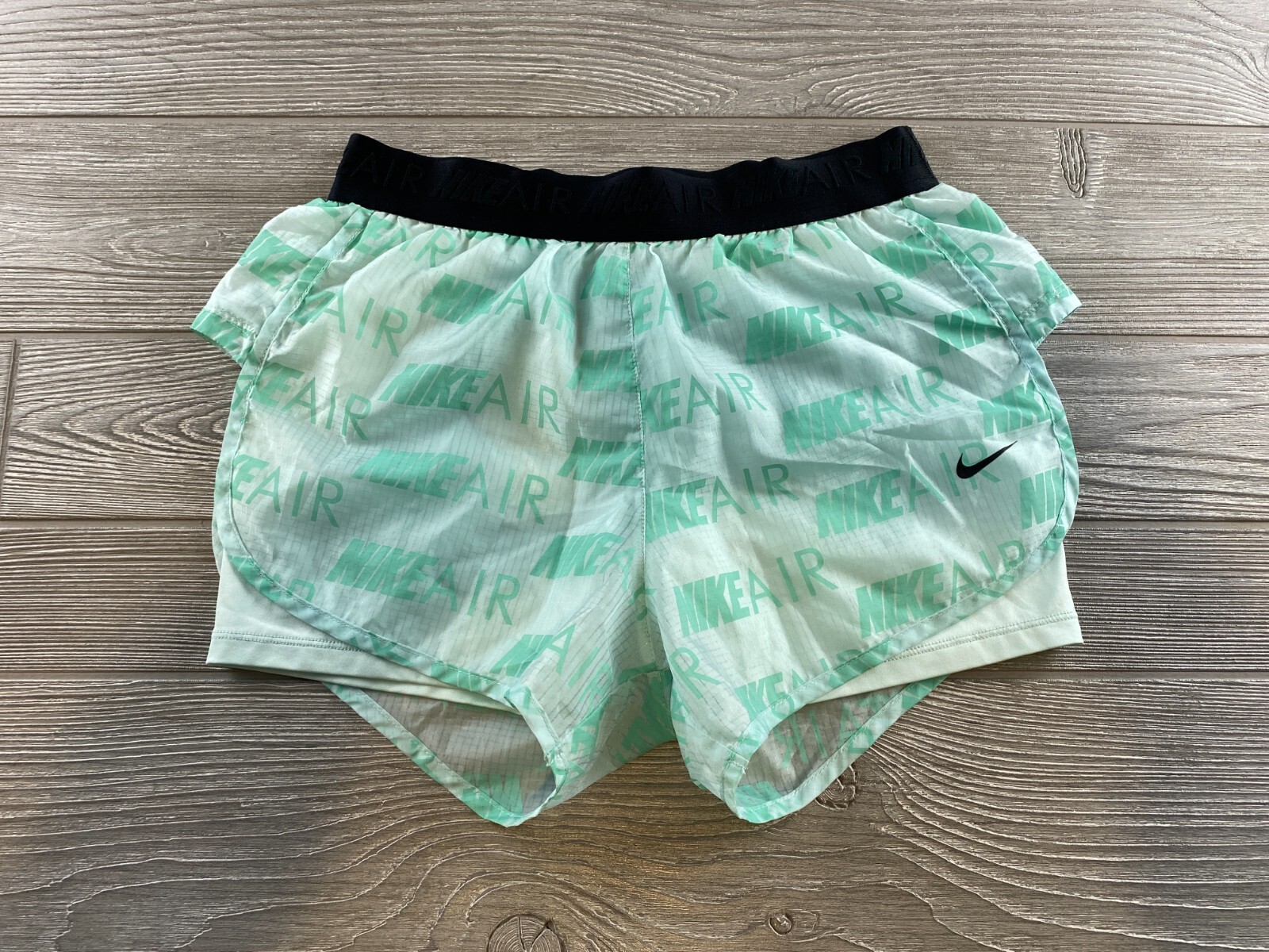 mint green nike shorts womens