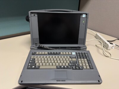 VINTAGE Dolch P-III Portable Computer powers up but screen is dark Sold AS-IS