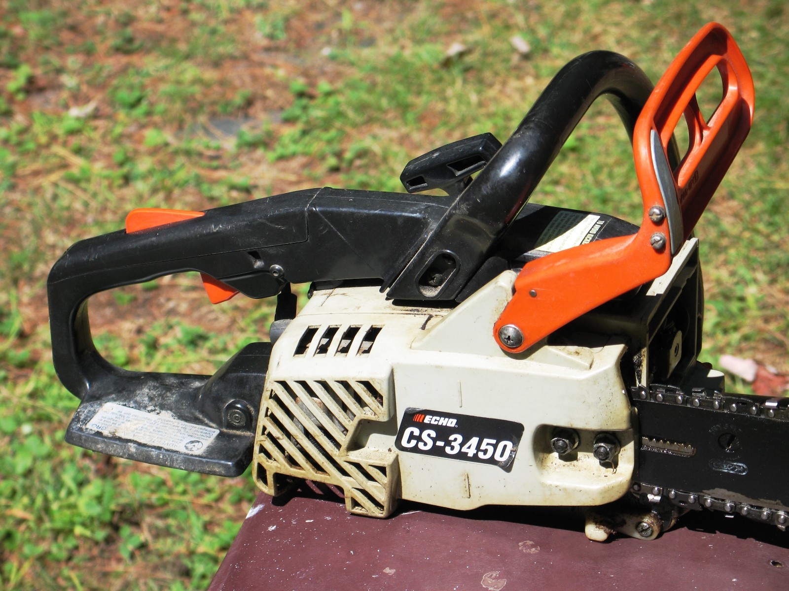 Echo CS-3450 Chainsaw. Needs TLC. Sat for awhile.