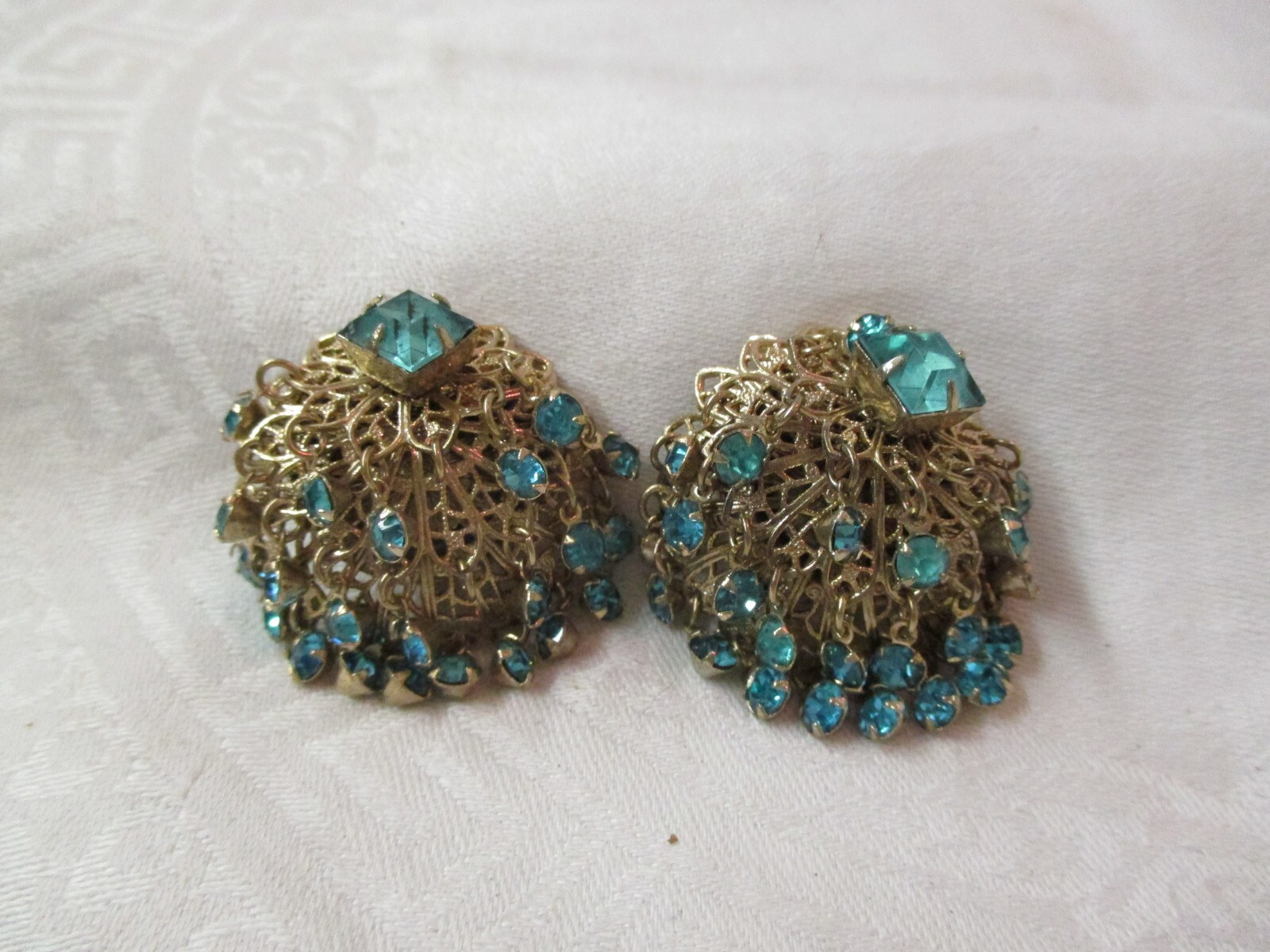 Vintage gold tone clip on Earrings with turquoise colored
