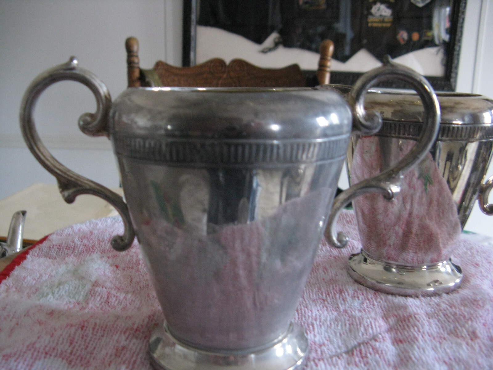 tall silver plated sugar and creamer4 1/5 in Canisil LTD imprinted on sugar bowl