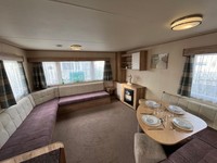 3 BEDROOM CARAVAN TOWYN 07792654549