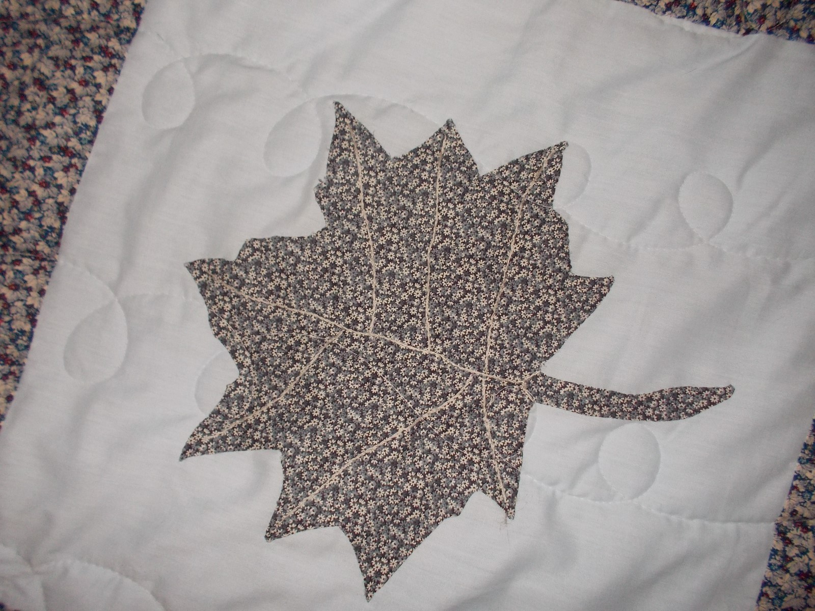 HAND MADE APPLIQUED QUILT-NEW -LEAF PATTERN. MACHINE QUILTED, TWELVE BLOCK BLUE