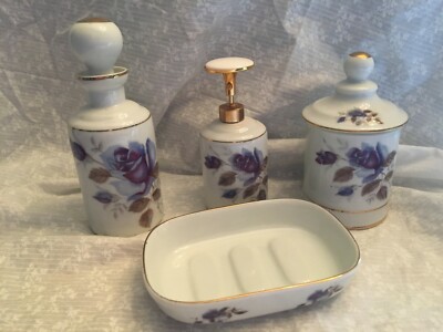 4 piece DeVilbiss vanity set. Soap dish, atomizer 4.75 in., covered cotton jar 