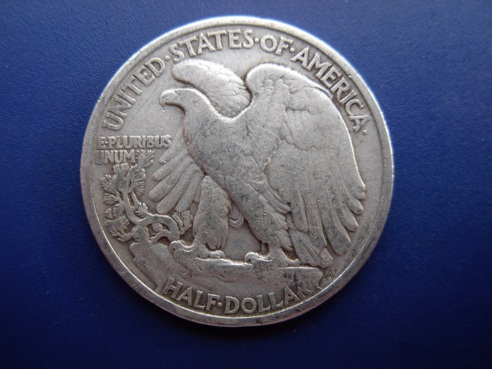 Very nice original 1935 Walking Liberty half in F condition. #2