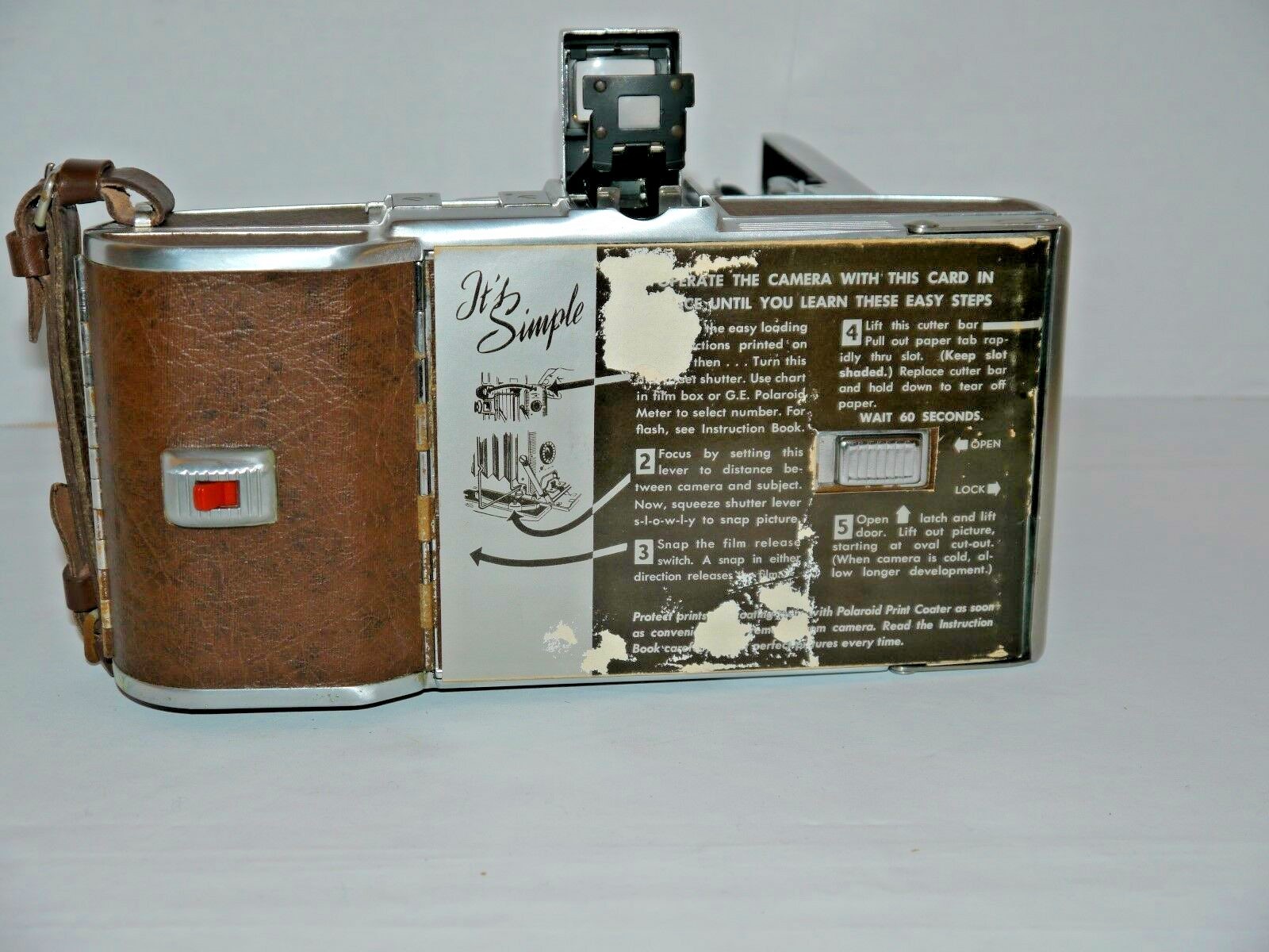 Polaroid speedliner land camera #95a w/polaroid wink-light-camera manuals