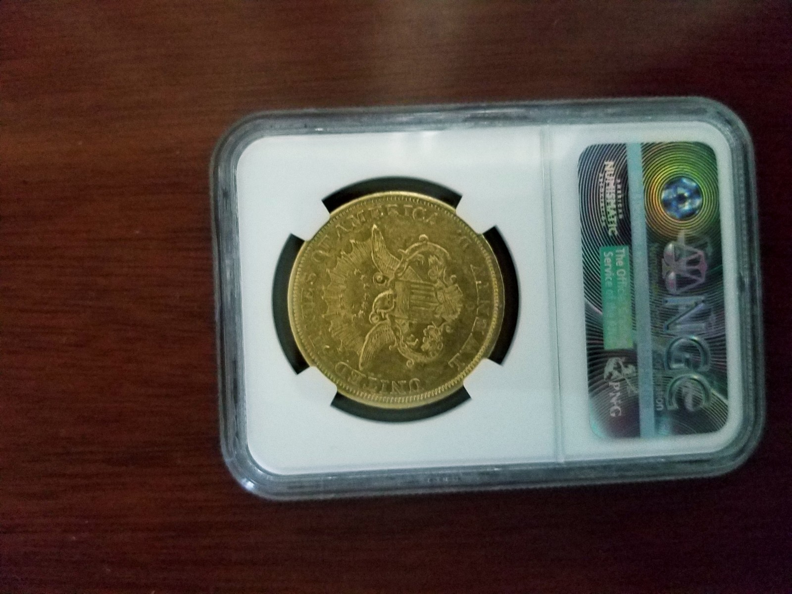 1852-O $20 GOLD LIBERTY AU-55 MINT ERROR