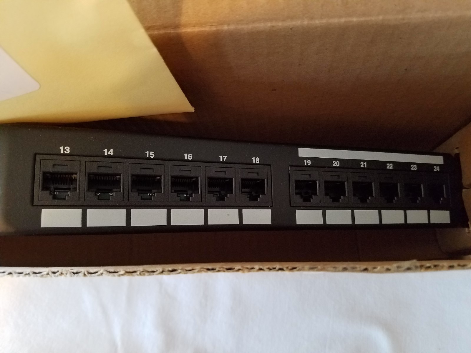 DPA245E88TGY Panduit Category 5e 24-Port Patch Panel Angled 1RU
