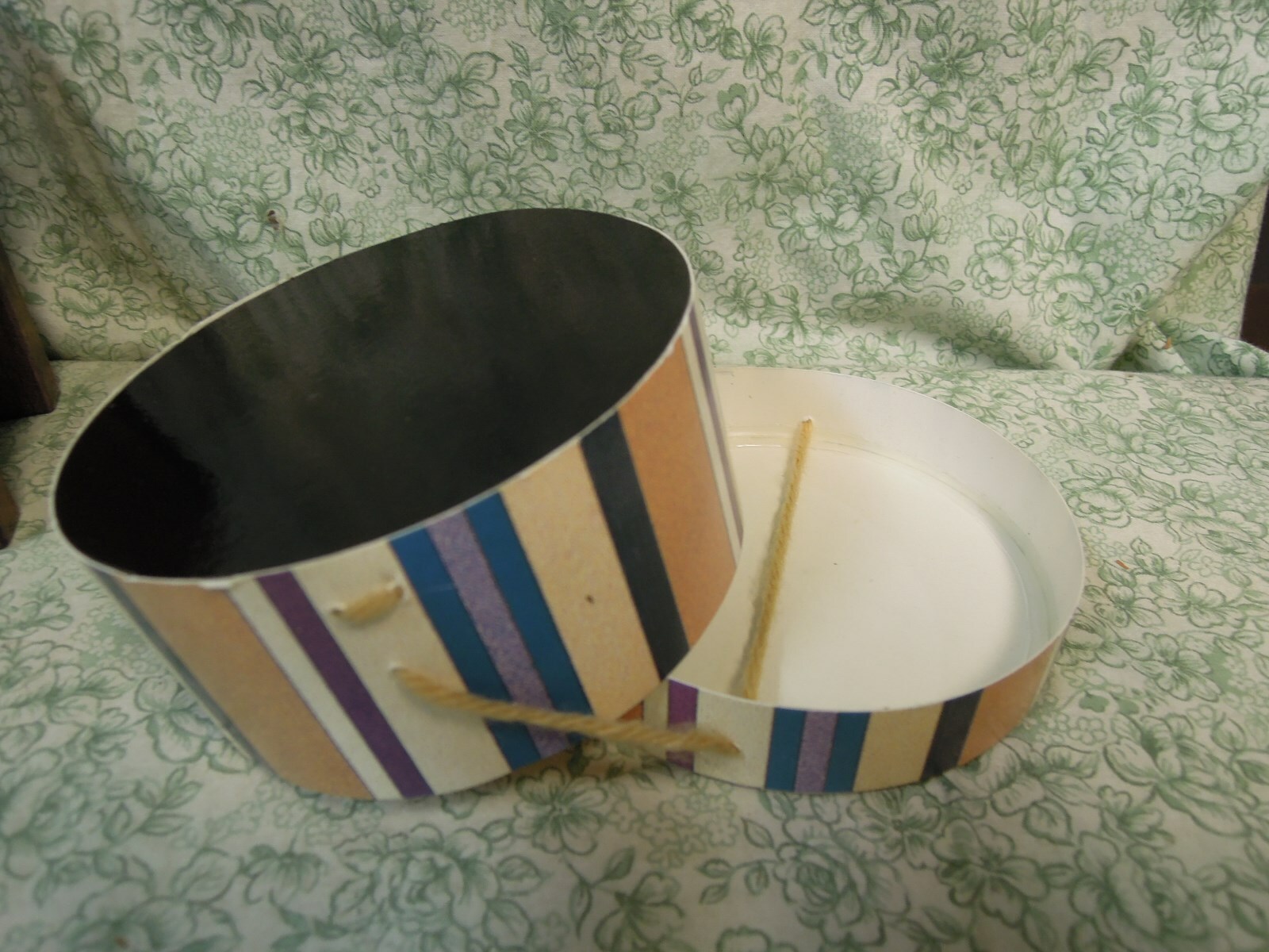 jk-121  GENE round Hat Box - gold top, striped sides; black bottom