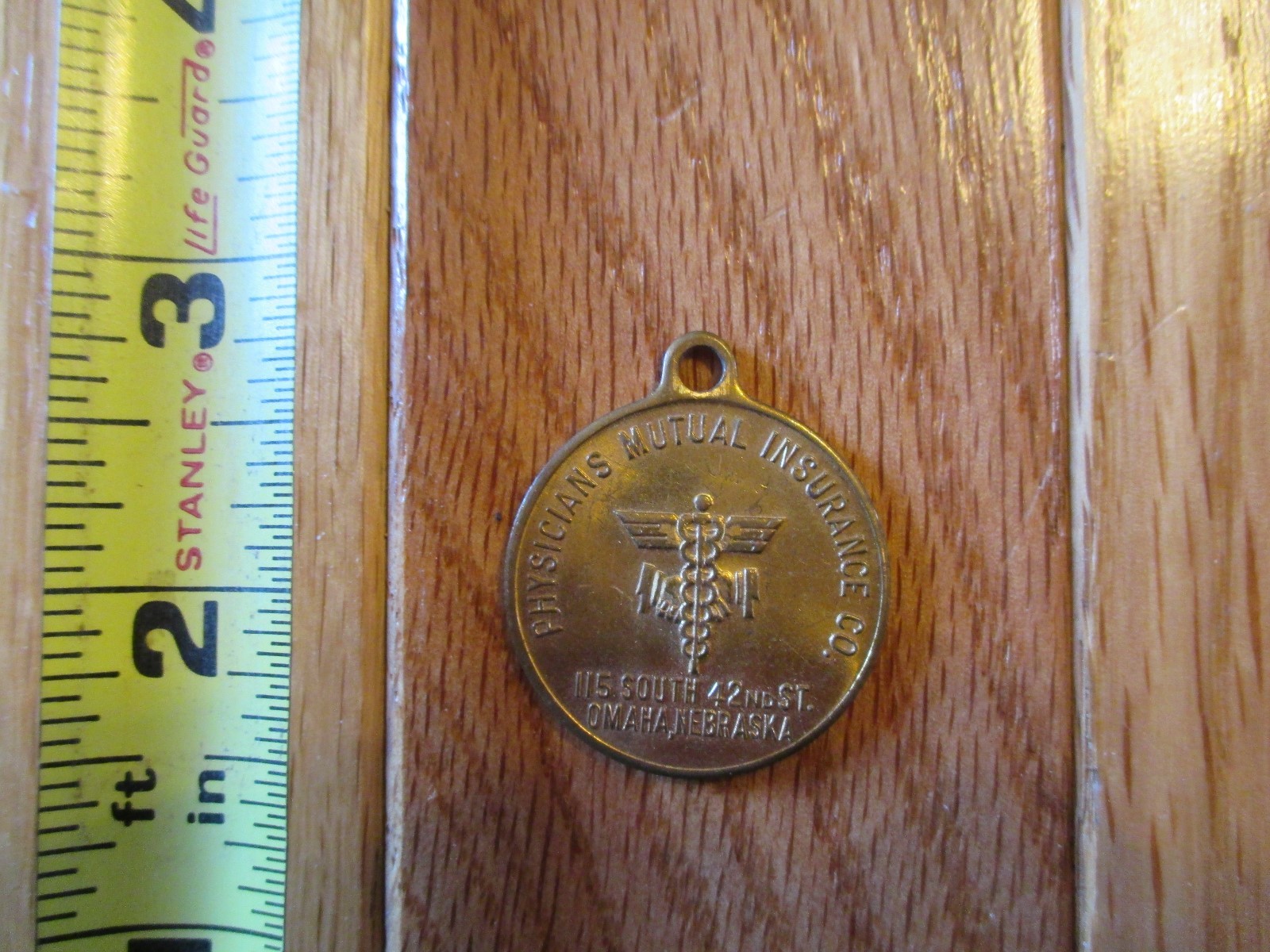 Physicians mutual insurance co omaha nebraska key chain fob Metal Token Coin