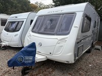 SWIFT CONQUEROR 530 - 4 BERTH CARAVAN WITH END WASHROOM + MOTORMOVER