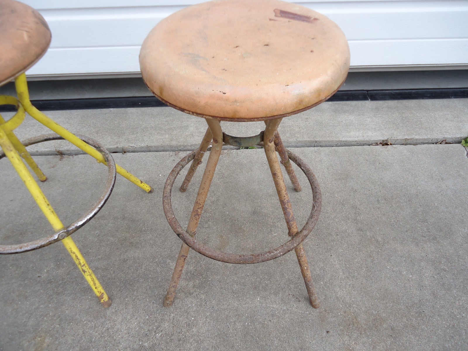 2 vintage Cosco Metal Swivel Stools that are in fair to poor shape with Rust NR