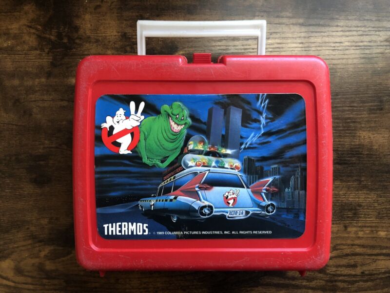 Vintage real Ghostbusters 2 lunchbox with thermos-Twin Towers in background 1989
